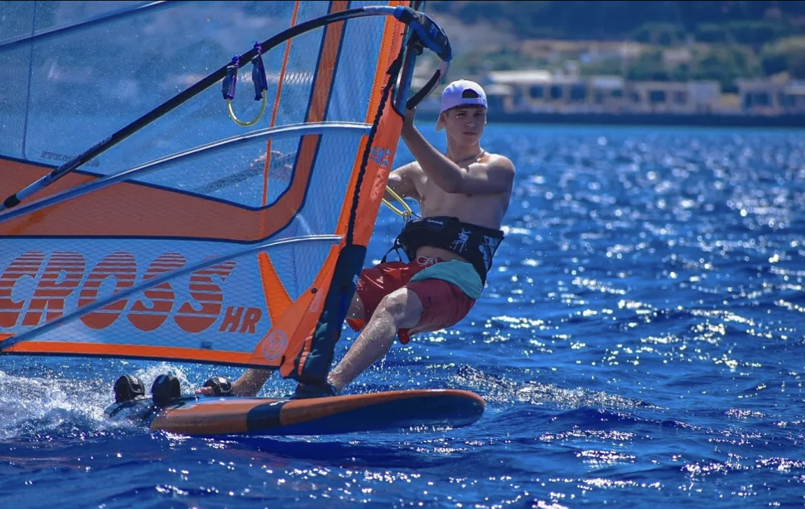 Athlete surfs the waves