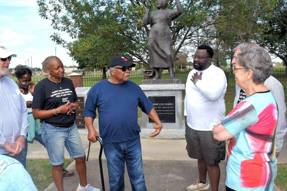 Charles McLaurin (center) joined visitors for the 2024 road trip and talked about his extensive work with Fannie Lou Hamer.