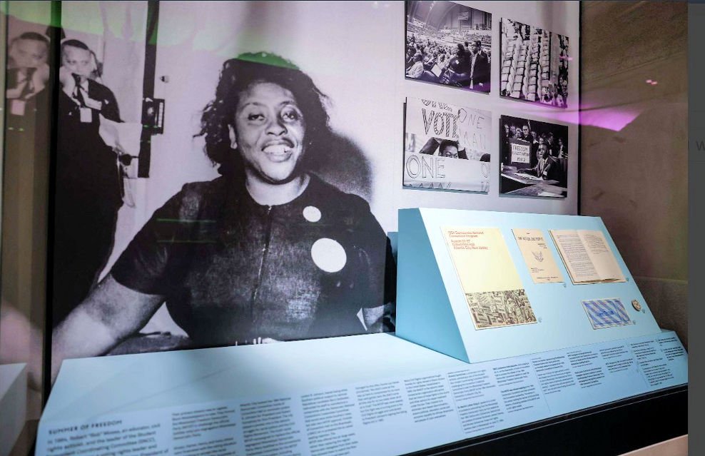 A dispay of Fannie Lou Hamer next to her statue on the Jim Whelan Boardwalk.