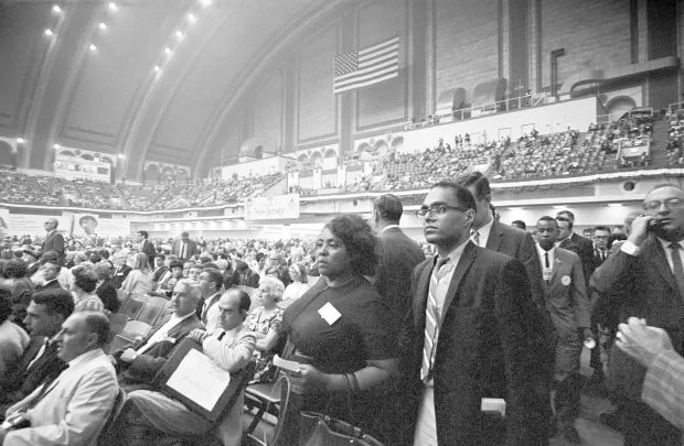 Robert P. Moses and Fannie Lou Hamer observe proceedings at the Democratic Convention.