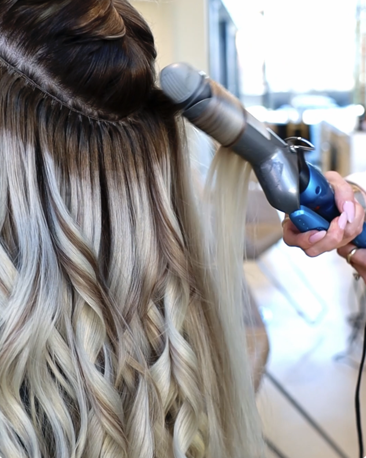 Hand-tied hair extensions before and after at Isla Salon Denver