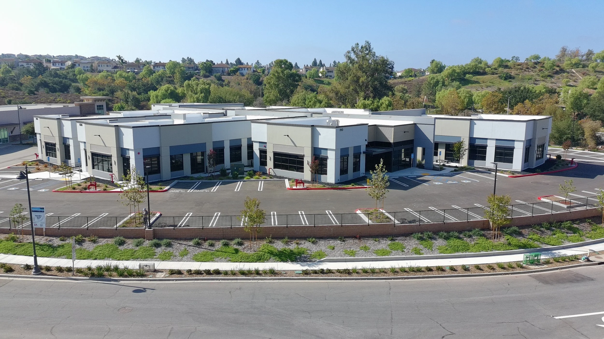 Front aerial view of Patriot Professional Plaza, a seven-building medical and professional office development in Moorpark, California.