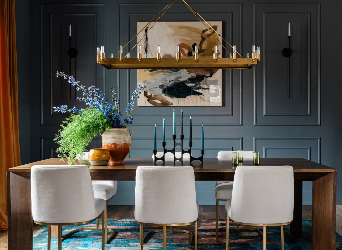 Swipe to see where we started! ✨

While the &ldquo;before&rdquo; had great bones and beautiful light, it lacked the soul and drama our clients were craving. By embracing a deep, saturated palette and architectural wall molding, we turned this dining 