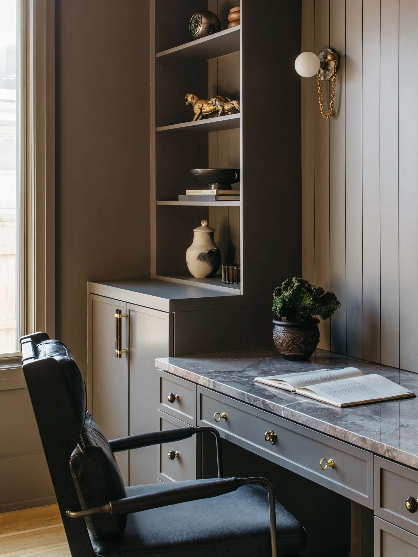 Working from home, redefined. ✨

For our Glenview residential project, we wanted to create a workspace that balances executive focus with residential warmth. This custom office nook is a study in texture&mdash;from the cool, veined marble desktop to 