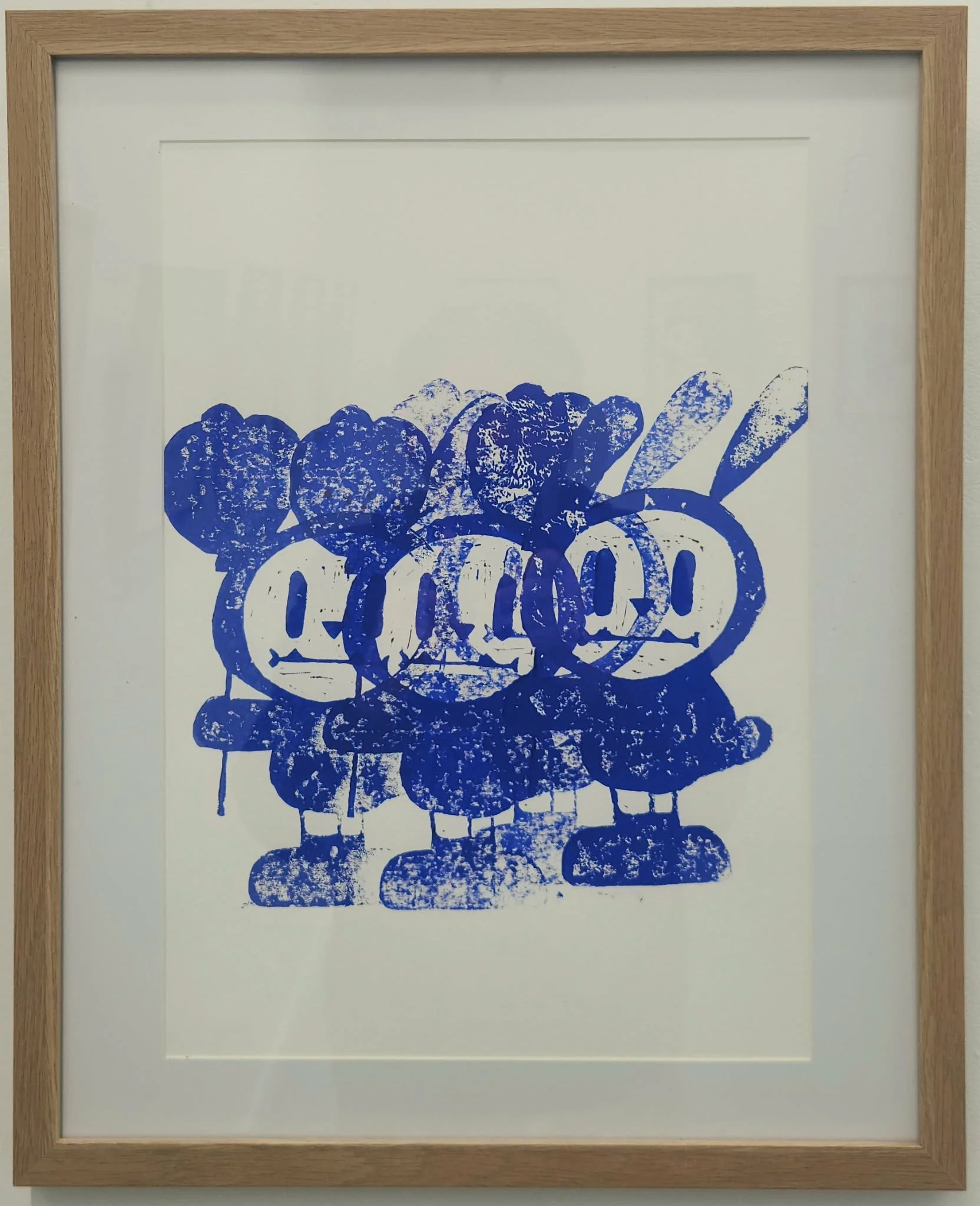 Framed multiple bule bunny lino print