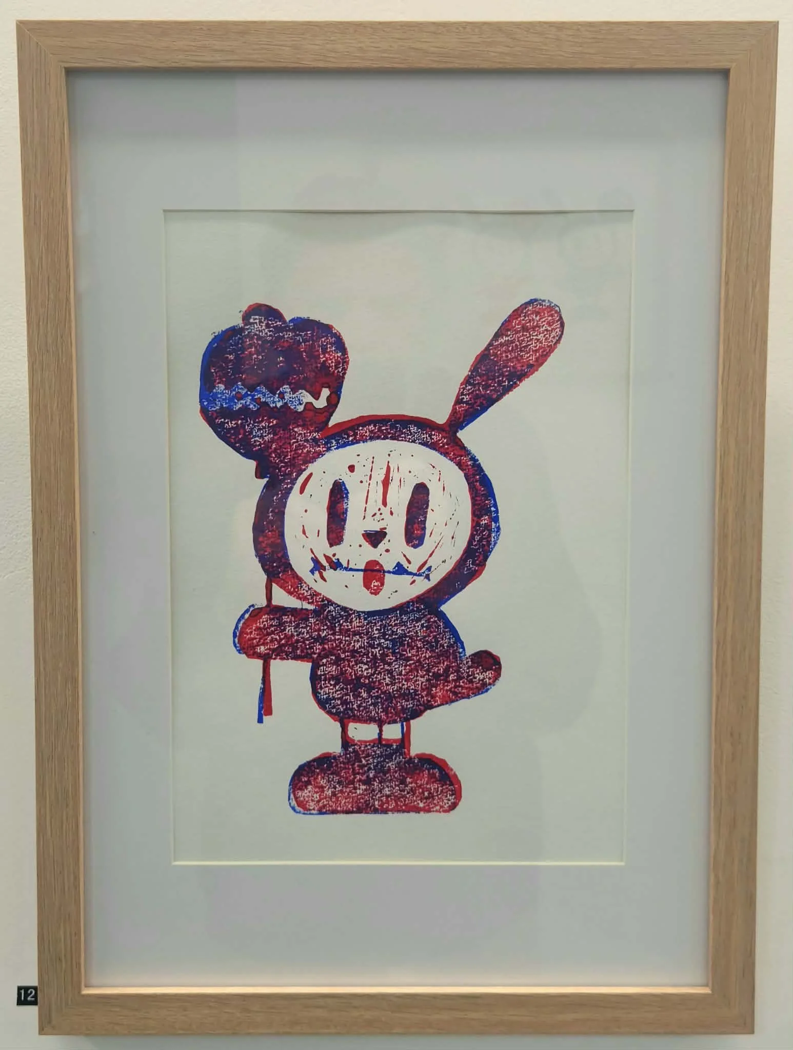 Framed blue and red pop bunny lino print