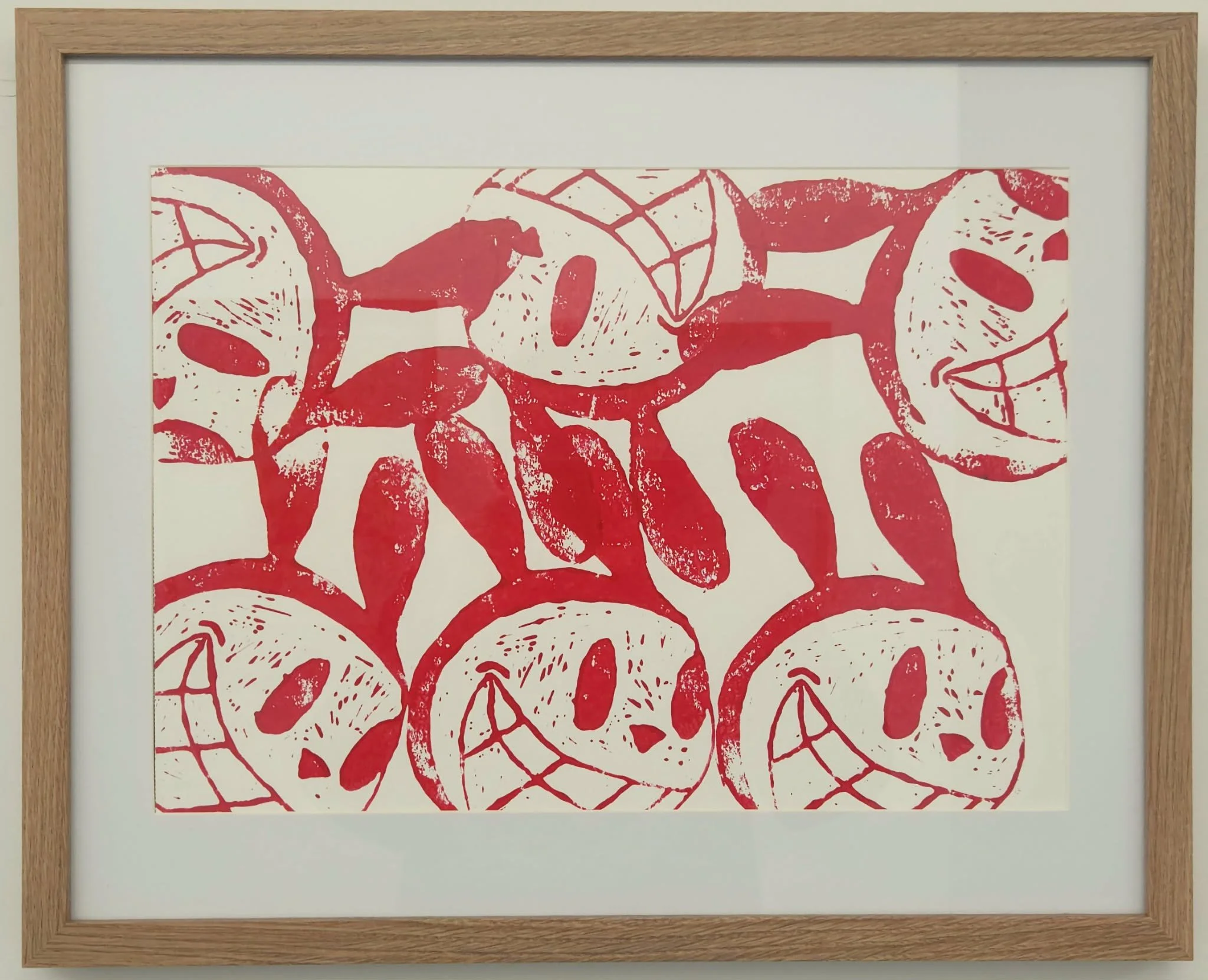 Framed red bunnys lino print