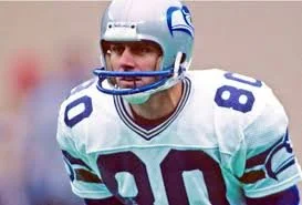 Steve Largent in the 80s background. Go Seahawks!