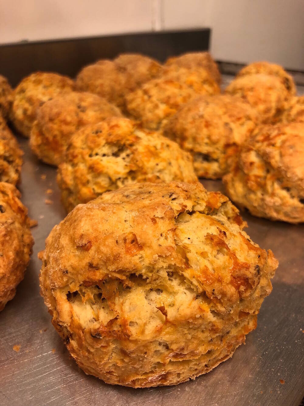 HAGGIS & CHEESE SCONES - Recipe from the robert burns birthplace museumIngredients1lb/500g self-raising flour4oz/100g margarinePinch of salt1oz/30g mature Scottish cheddar2oz/60g grated uncooked haggis2 beaten eggsMilkMethodSet your oven to 165C/330F/Gas mark 3.Rub the flour, margarine and salt together until the texture resembles fine breadcrumbs.Mix in the cheese and haggis, and then add the eggs and enough milk to create a soft dough mixture.Turn out onto a dry floured surface and roll to about 1.5 inches/4cm thick.Use a scone ring cutter to cut out your scones.You can brush the top of the scones lightly with milk or beaten egg to give a stronger colour if desired, but this is not essential.Place them on a metal baking tray and cook in the oven for 15–20 minutes until lightly browned on top.Enjoy!