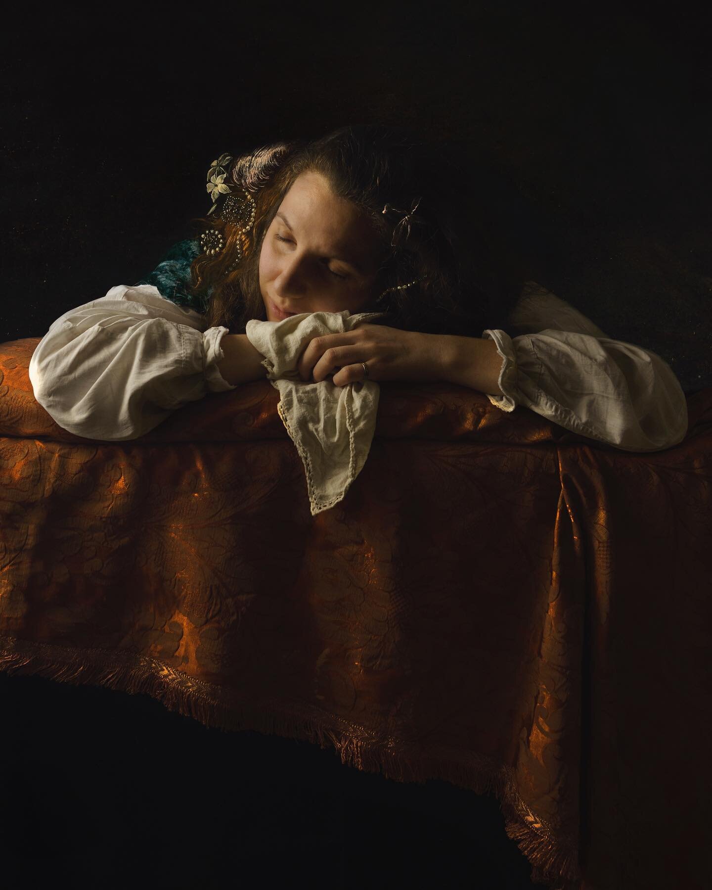 I re-enacted the sleeping girl of a beautiful oil painting by an unknown 17th-century artist (previously attributed to Theodoor Van Loon or Domenico Fetti). I did it by staying slumped for an entire afternoon over an ironing board covered with brocad