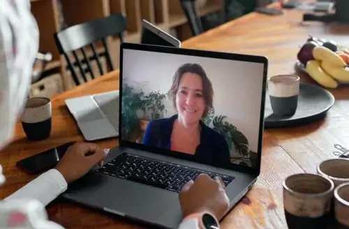 Computer screen with female top-rated Life Coach Karin
