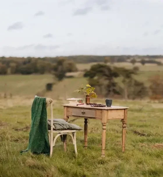 Table and chair in nature with vast views