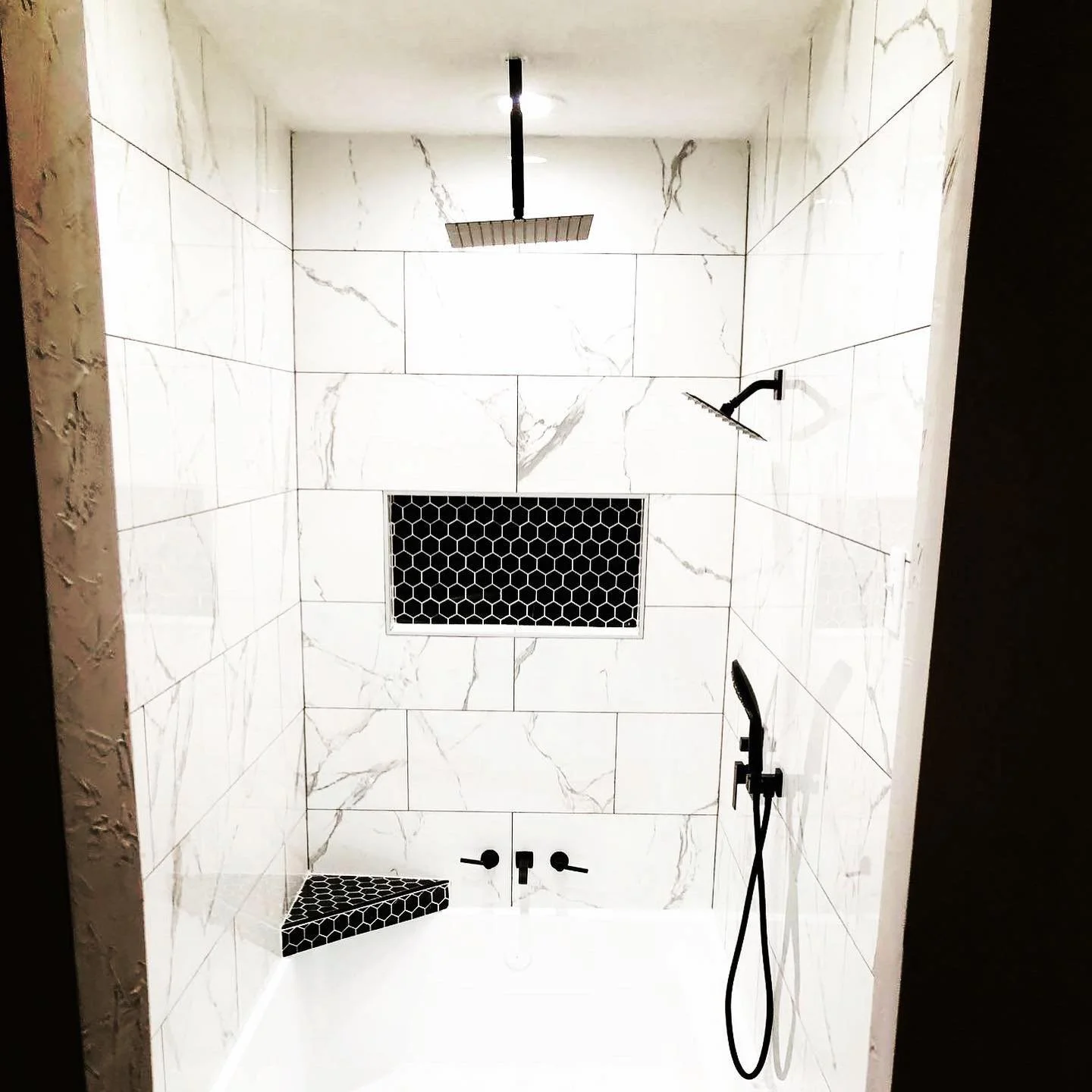 Shower remodel faux marble tile