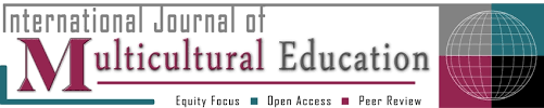 Logo of the International Journal of Multicultural Education featuring a globe and the journal's name.