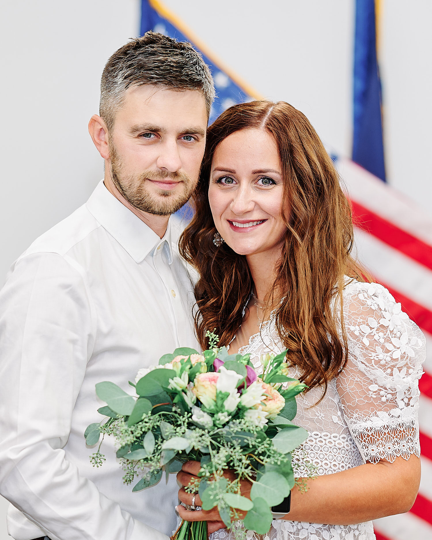  Olga Shuleika and Dzmitry Hryher are tying the knot on a hot summer day in a private ceremony in Pittsburgh city magistrate. The girl looks beautiful in small white lace dress and she is pregnant. 