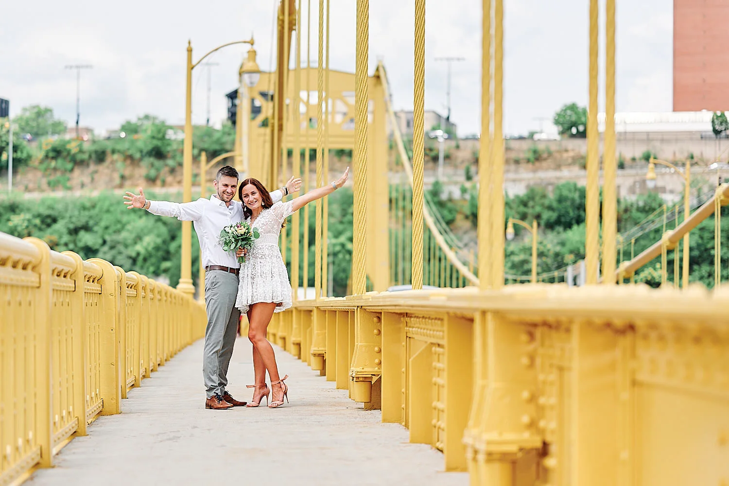  Olga Shuleika and Dzmitry Hryher are tying the knot on a hot summer day in a private ceremony in Pittsburgh city magistrate. The girl looks beautiful in small white lace dress and she is pregnant. 
