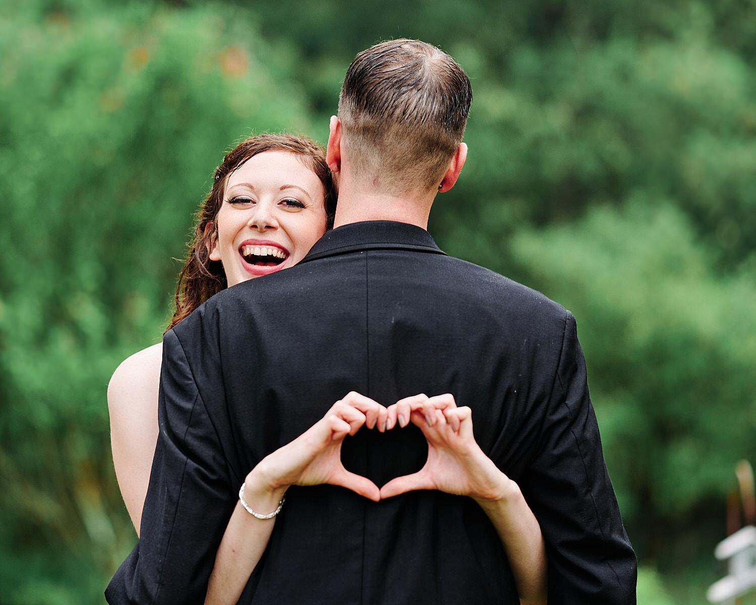  Alyssa Busching and George Goettel are getting married in their grandparents’ backyard under the pouring rain in the minds of the COVID-19 pandemic with only closest friends and family at the ceremony 