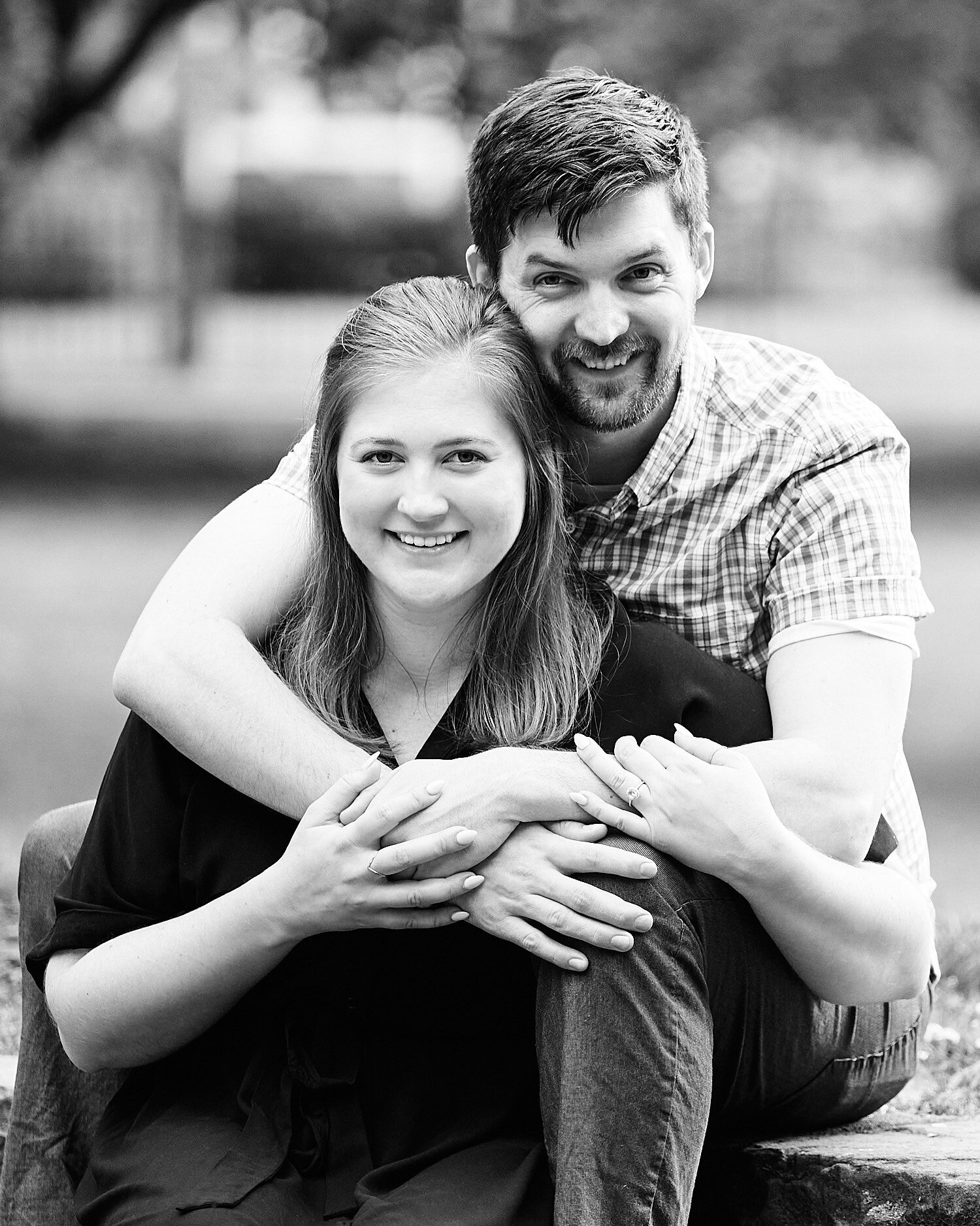  Katie Trovato and Jake Carrigan are posing for their surprise engagement photos. It was a surprise session in the park Sewickley, PA where Katue used to climb trees with her sister Sarah as a child. 