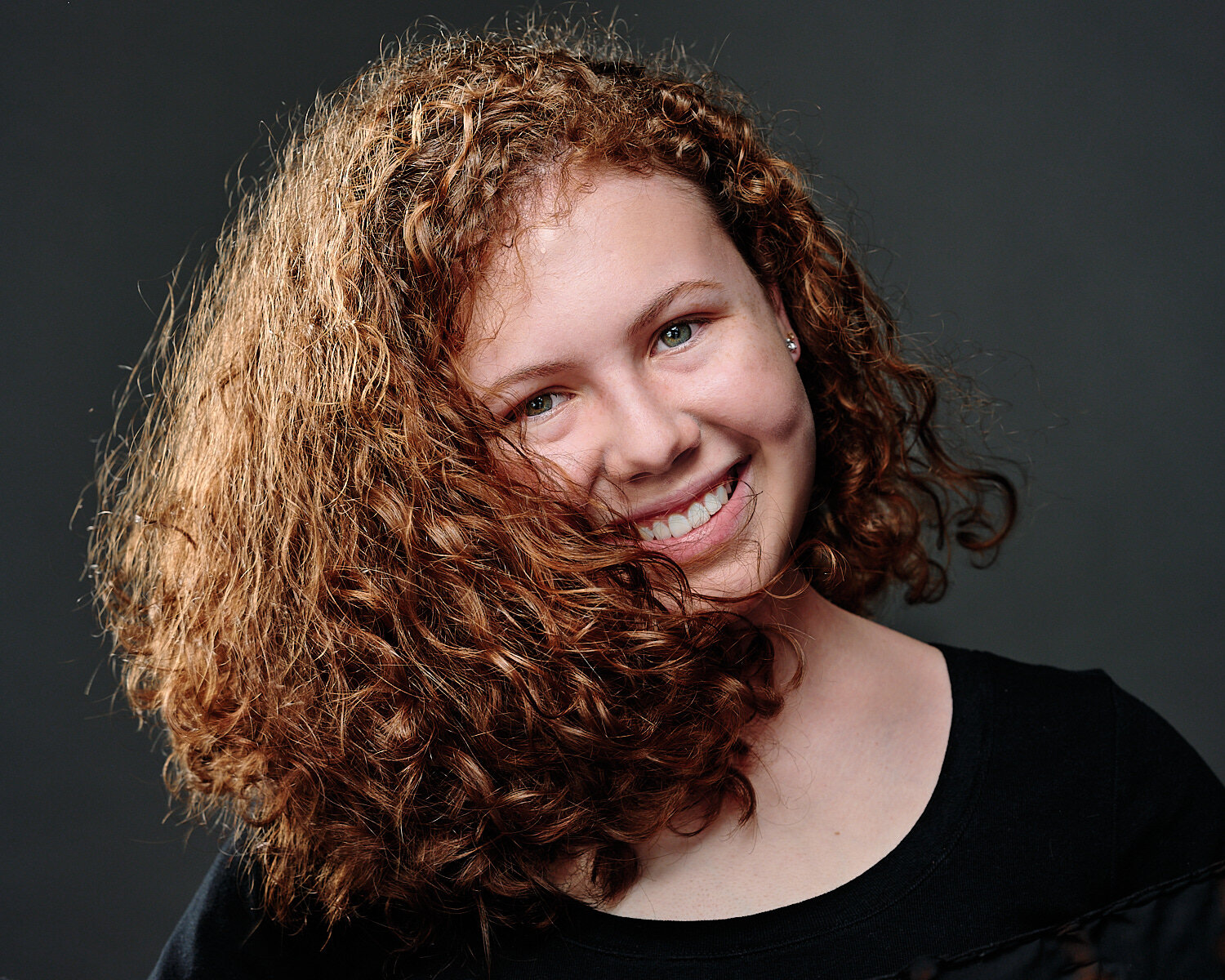 An teenage actor headshot for Sewickley Academy’s high school musical “The 25th Annual Putnam County Spelling Bee” in 2021. The portraits were done in a professional photography studio. Pittsburgh, PA