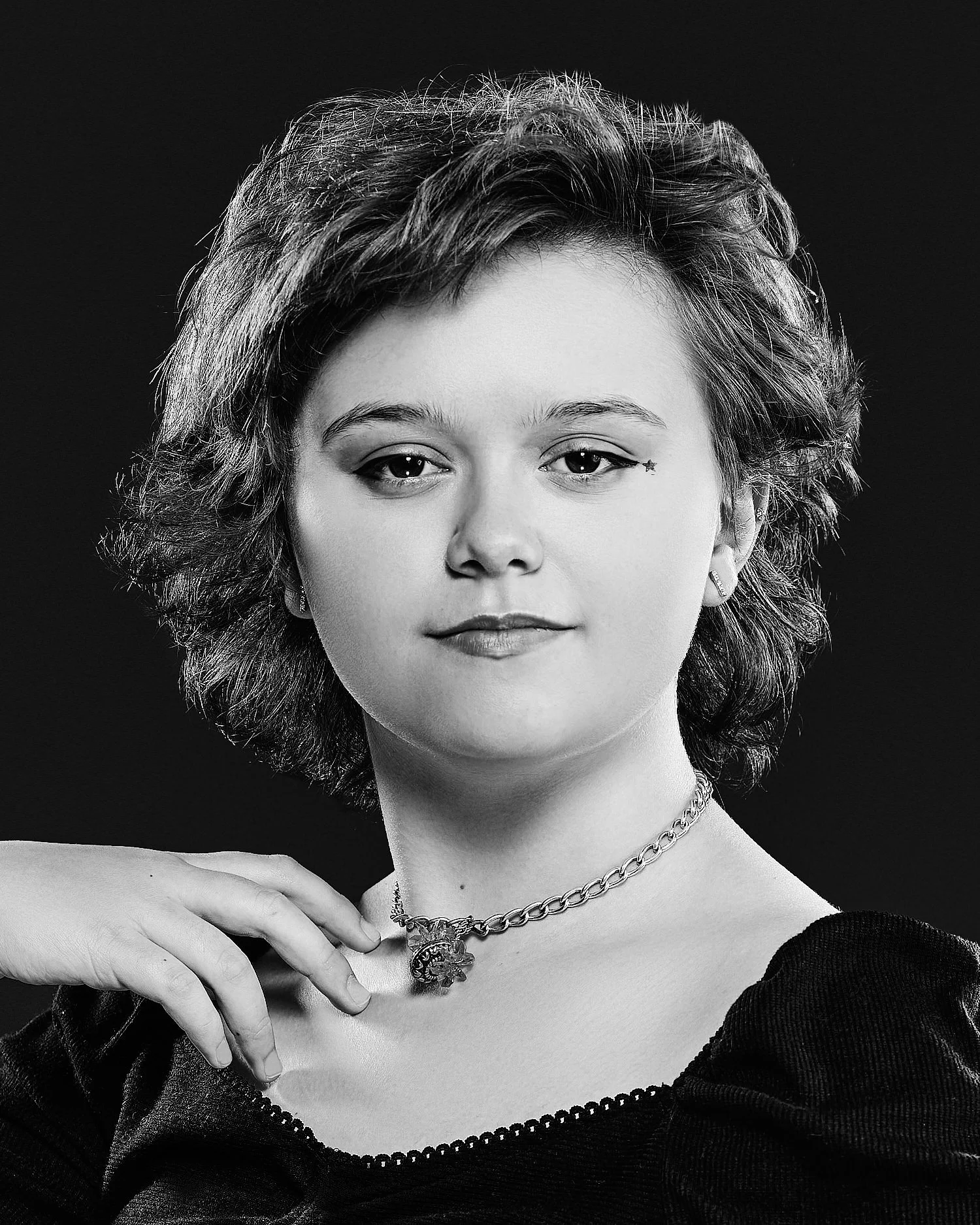  A high school student is posing for headshots for Sewickley Academy’s Fall 2021 theater play “12 Angry Jurors”. The young actor is professionally lit against grey background. 