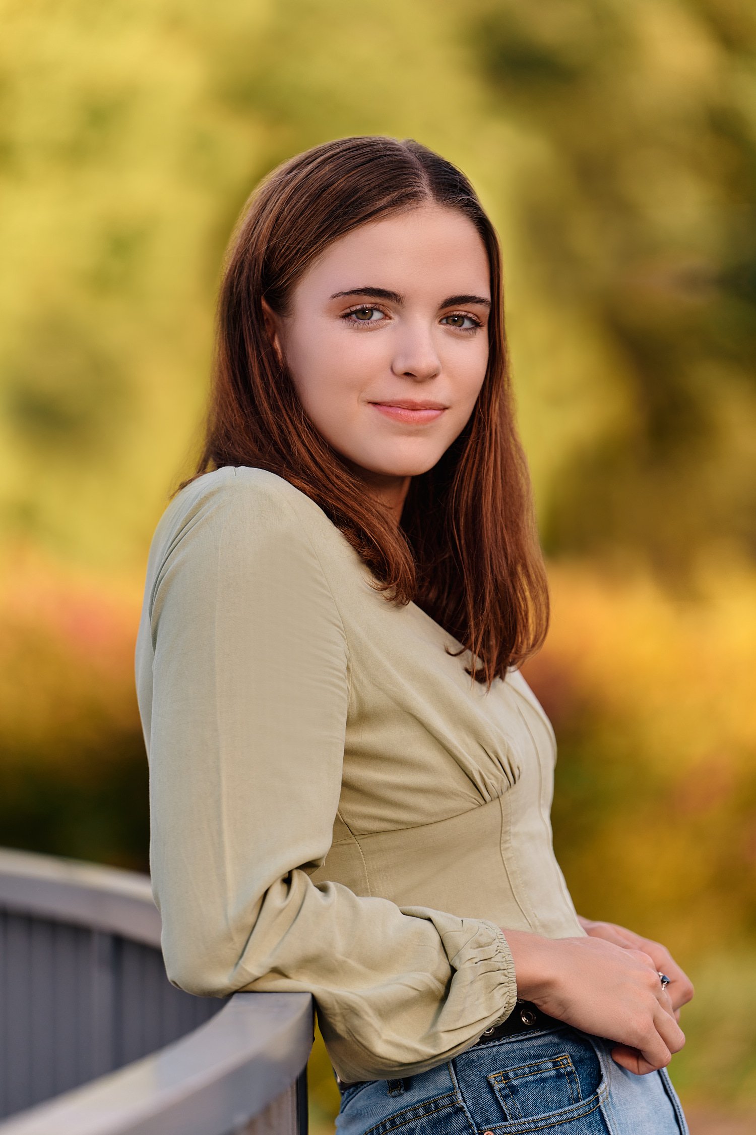  Josephine Reiter is posing for high school senior portraits at Phipps Conservatory in Schenley park and Homewood Cemetery in Pittsburgh. The October fall foliage colors are beautiful yellow & orange 