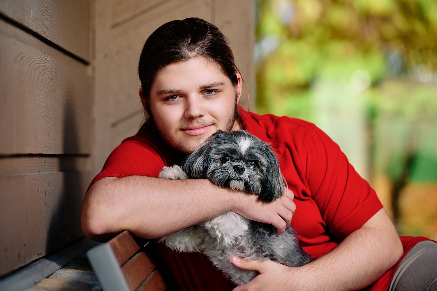  Zach Elkin of SA is posing for high school senior portraits in his family home in Sewickley Heights. He looks handsome in suit, polo shirt and playing with his dogs - in the backyard and in the house 