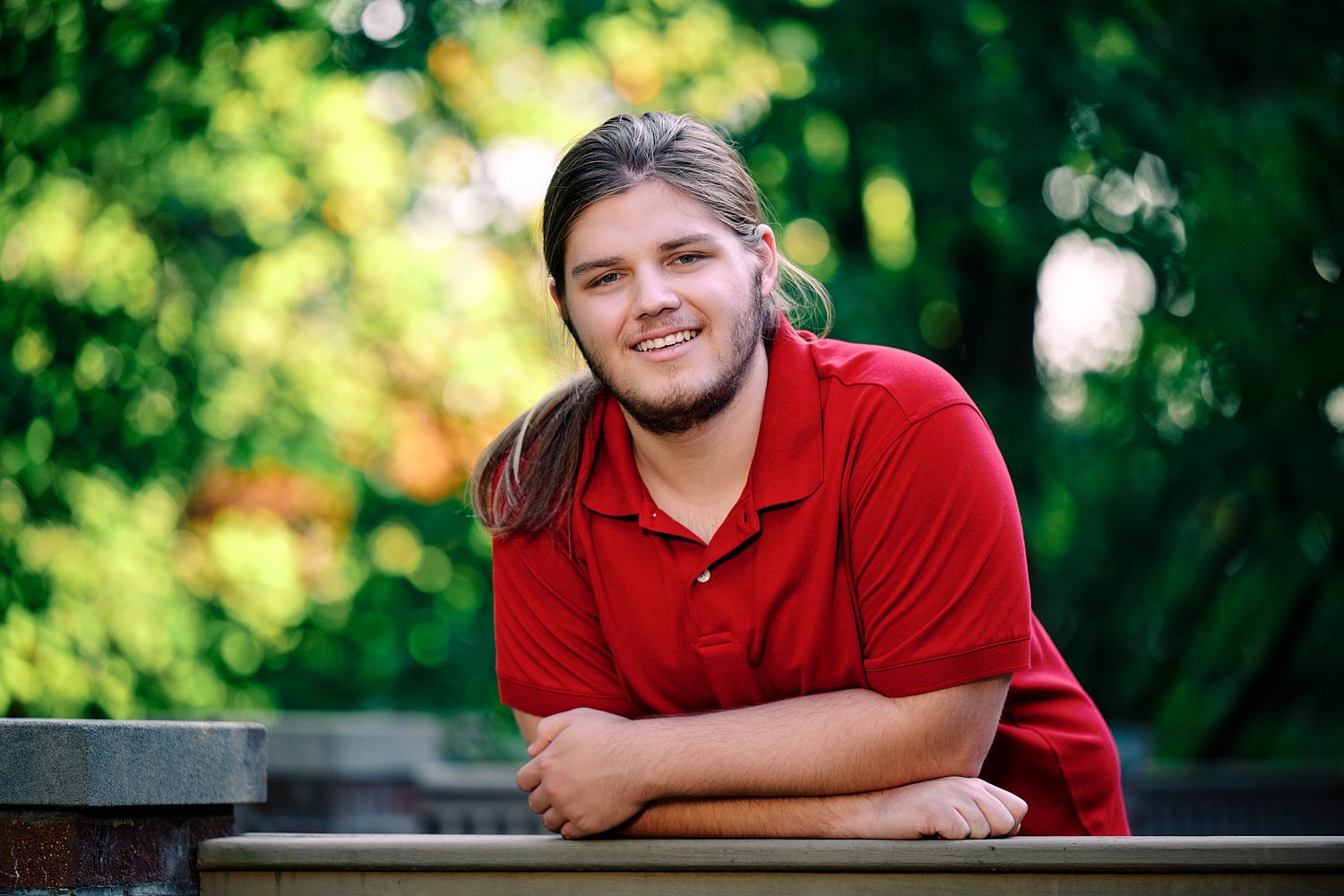  Zach Elkin of SA is posing for high school senior portraits in his family home in Sewickley Heights. He looks handsome in suit, polo shirt and playing with his dogs - in the backyard and in the house 