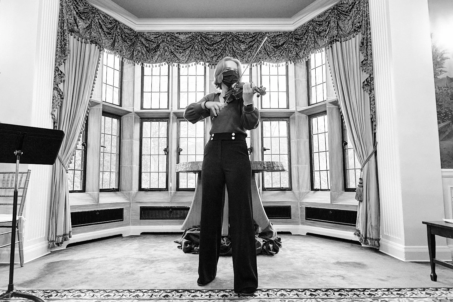  Alena Gurevich, a 16 year-old girl, is performing a musical piece on violin at Edgeworth Club in Sewickley, Pennsylvania for CYM Center of Young Musicians Christmas mid-year Concert for parents. 