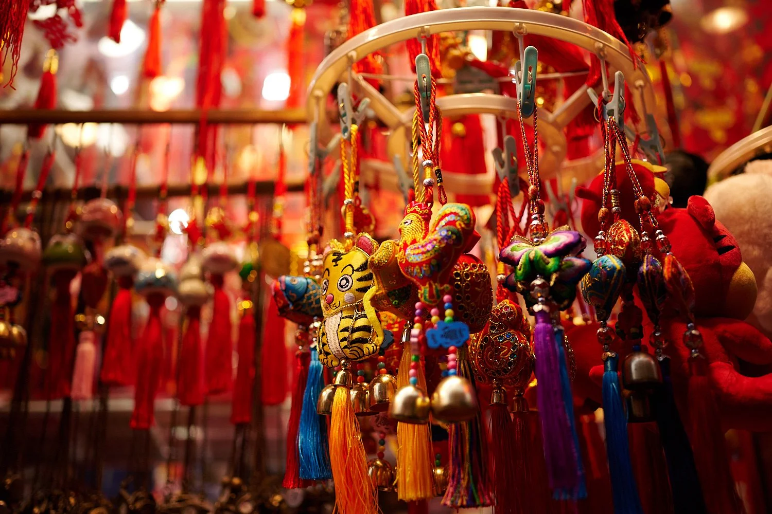  NEW YORK CITY, USA - DECEMBER 11TH 2021: Christmas and New Year of Tiger celebrations at Chinatown. The Chinese lanterns shine brightly and produce beautiful reflections on the wet surfaces. 