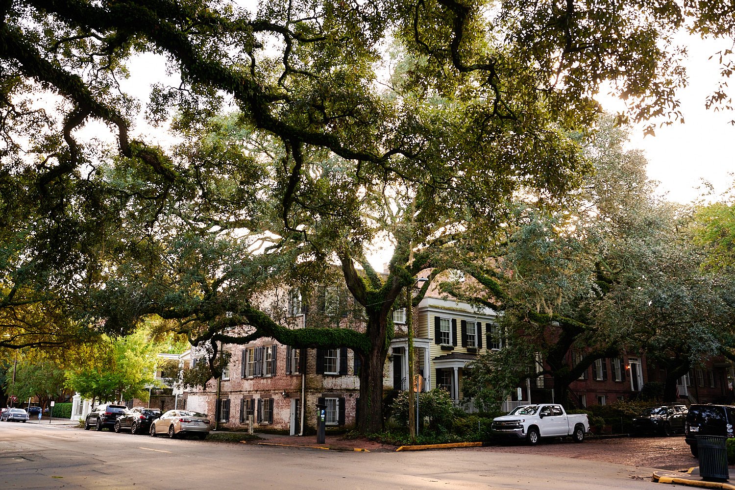  Savannah, Georgia, USA - OCTOBER 9TH 2021: the street views of the city on a warm autumn evening lit by the setting sun. It’s still COVID pandemic but noone is wearing masks. 