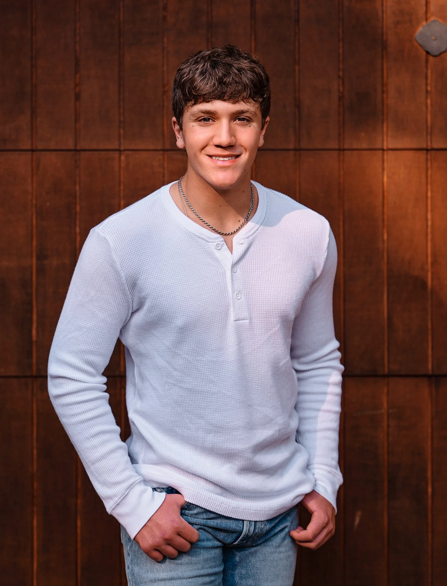  Colin Elias is posing for his high school senior portraits at Robin hill Park and at the baseball field in Moon park near Pittsburgh, PA. It’s still hot and sunny in September and feels like summer. 