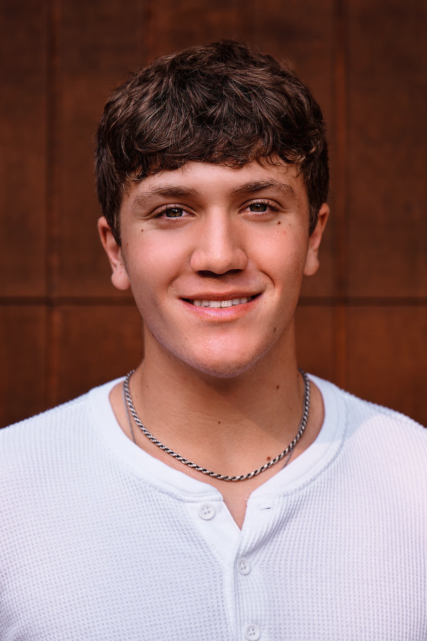  Colin Elias is posing for his high school senior portraits at Robin hill Park and at the baseball field in Moon park near Pittsburgh, PA. It’s still hot and sunny in September and feels like summer. 