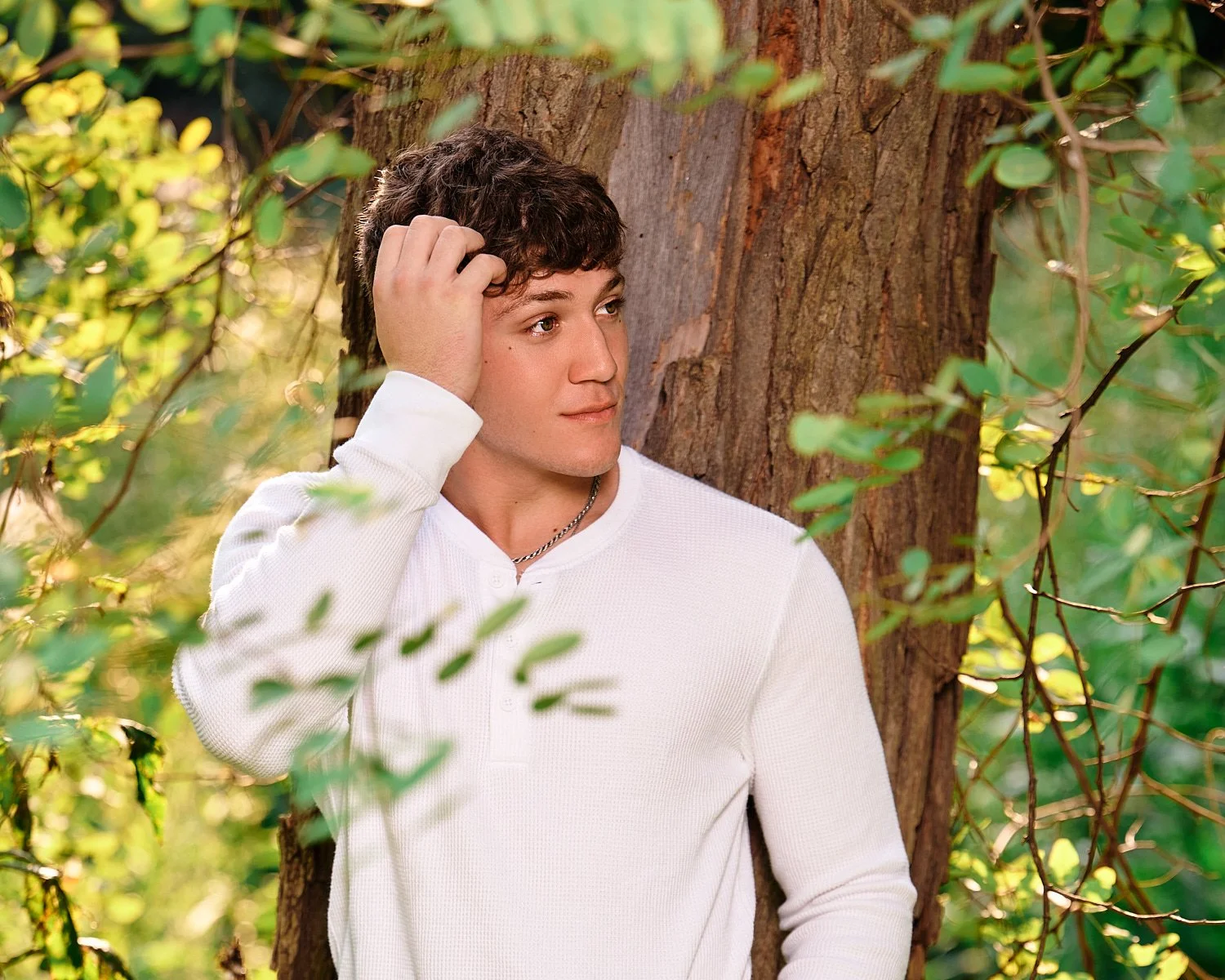  Colin Elias is posing for his high school senior portraits at Robin hill Park and at the baseball field in Moon park near Pittsburgh, PA. It’s still hot and sunny in September and feels like summer. 