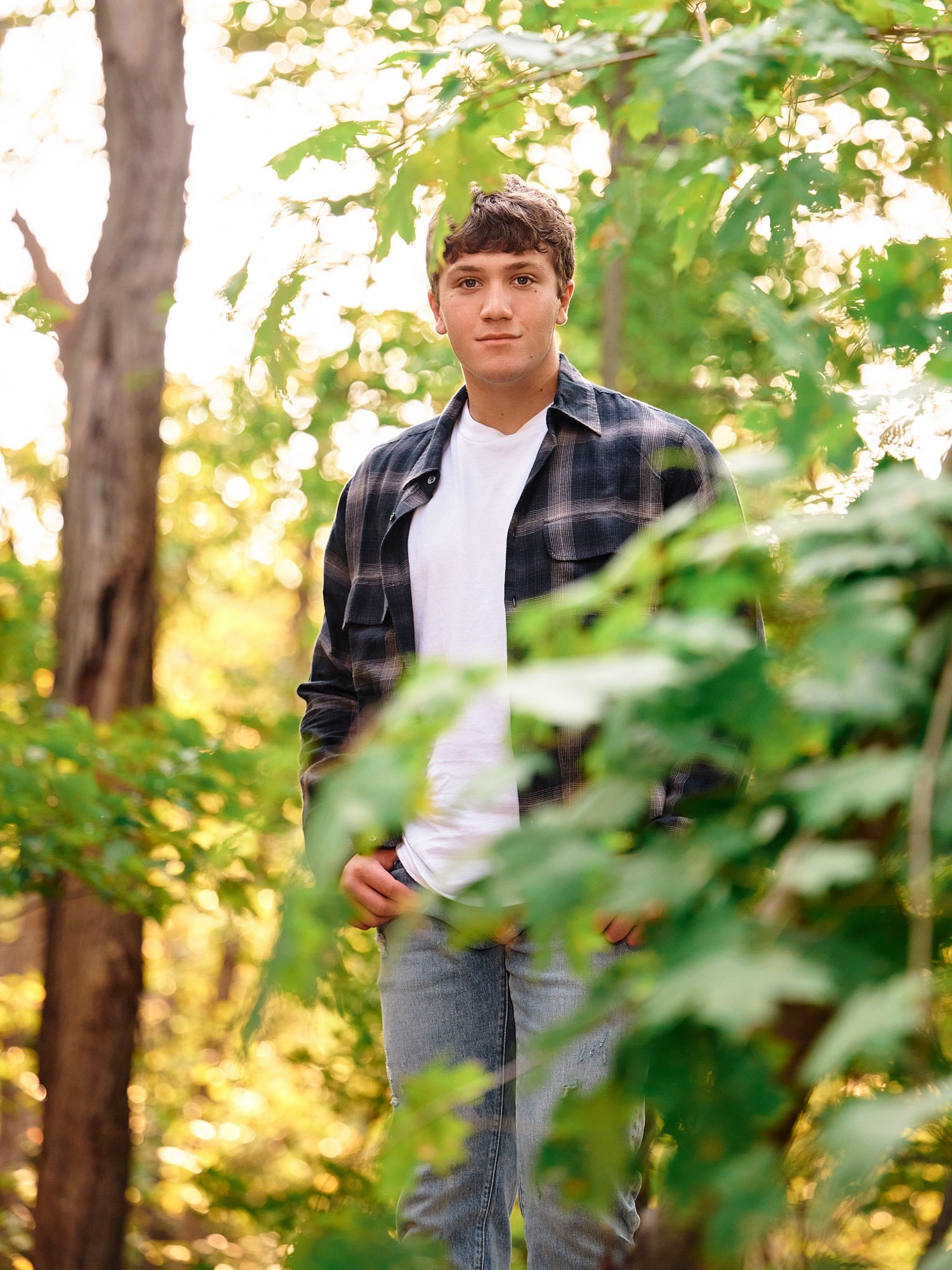  Colin Elias is posing for his high school senior portraits at Robin hill Park and at the baseball field in Moon park near Pittsburgh, PA. It’s still hot and sunny in September and feels like summer. 