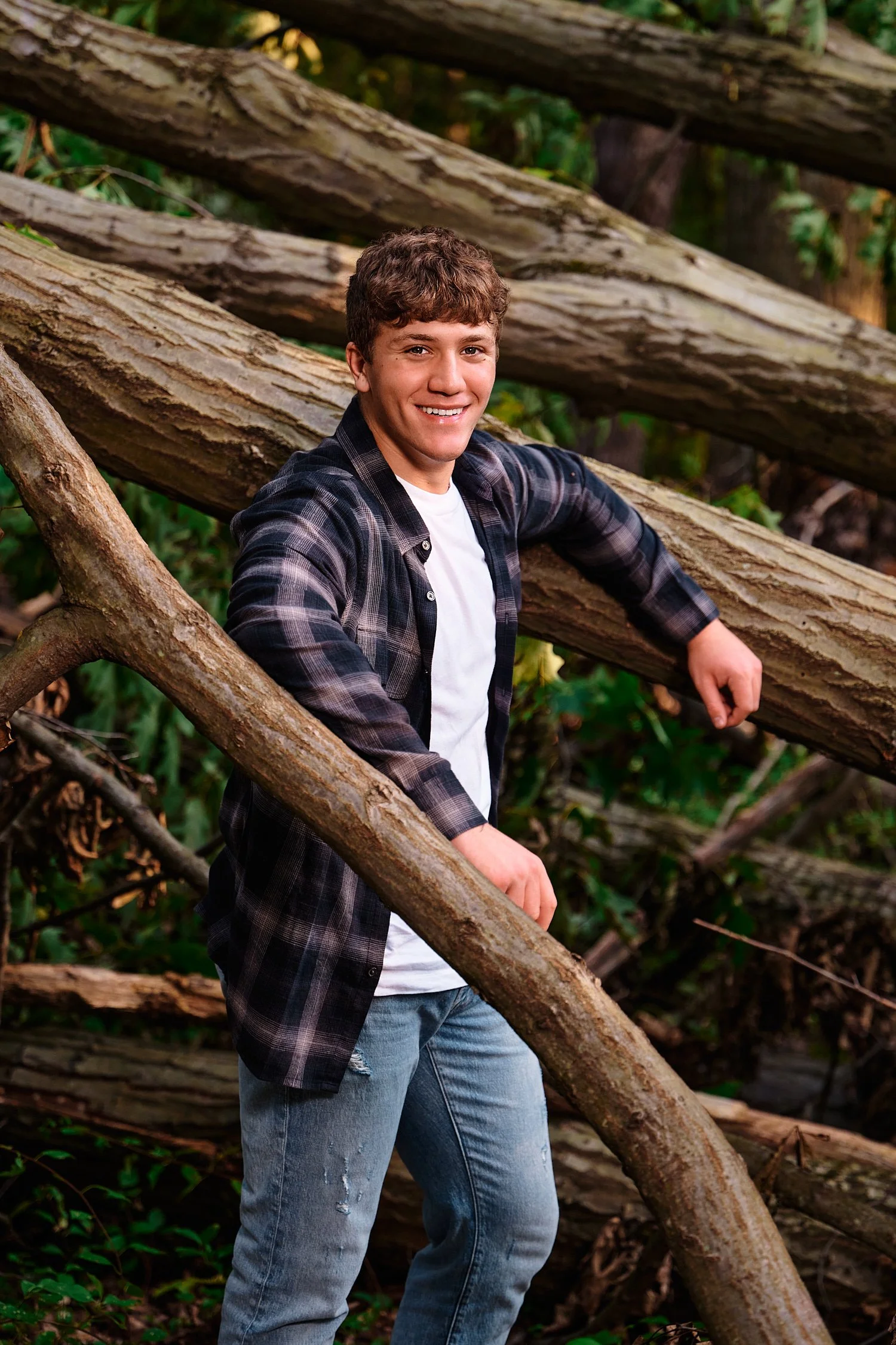  Colin Elias is posing for his high school senior portraits at Robin hill Park and at the baseball field in Moon park near Pittsburgh, PA. It’s still hot and sunny in September and feels like summer. 