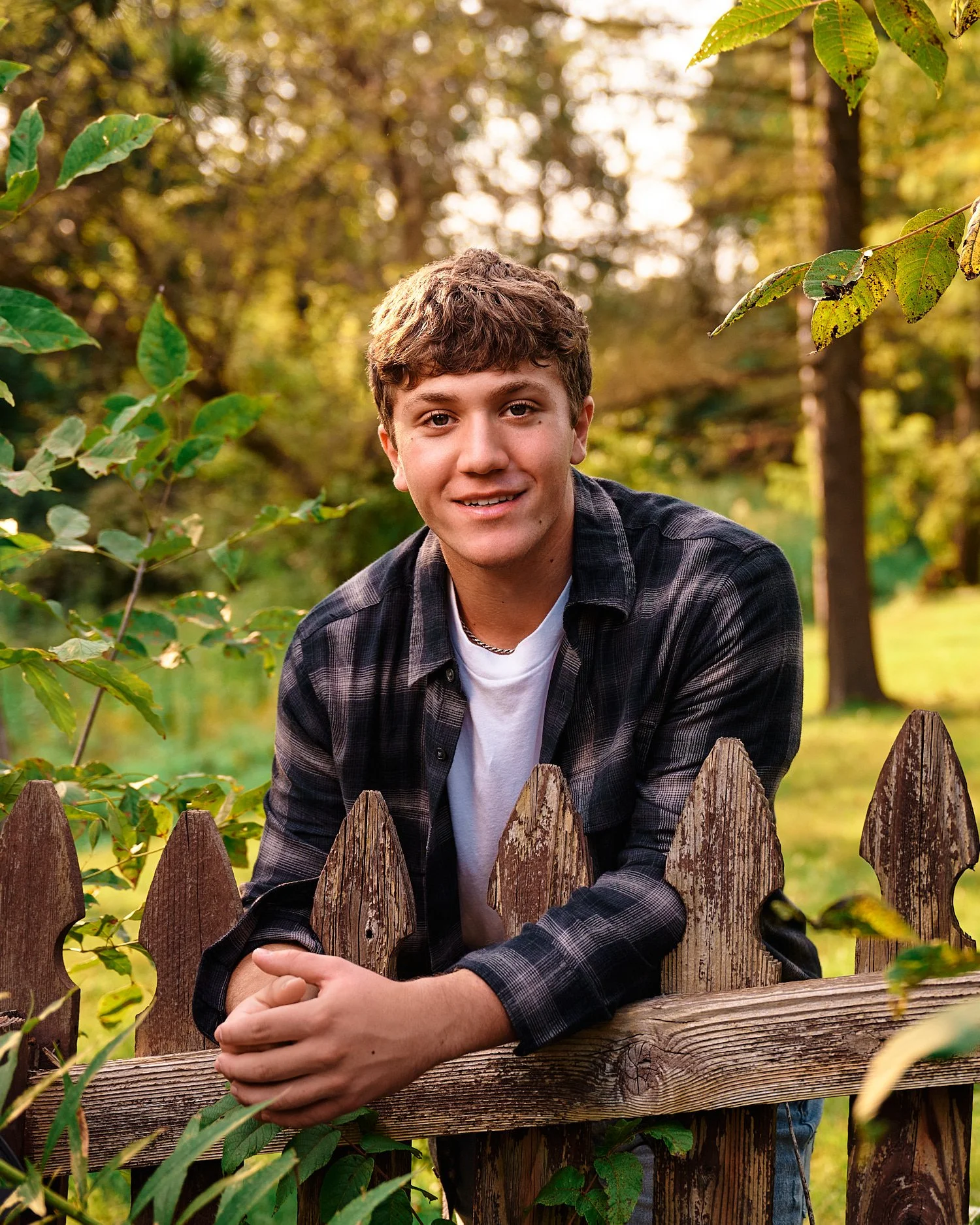  Colin Elias is posing for his high school senior portraits at Robin hill Park and at the baseball field in Moon park near Pittsburgh, PA. It’s still hot and sunny in September and feels like summer. 