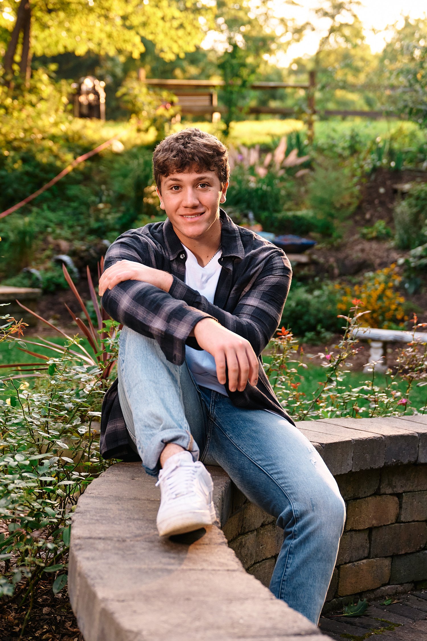  Colin Elias is posing for his high school senior portraits at Robin hill Park and at the baseball field in Moon park near Pittsburgh, PA. It’s still hot and sunny in September and feels like summer. 