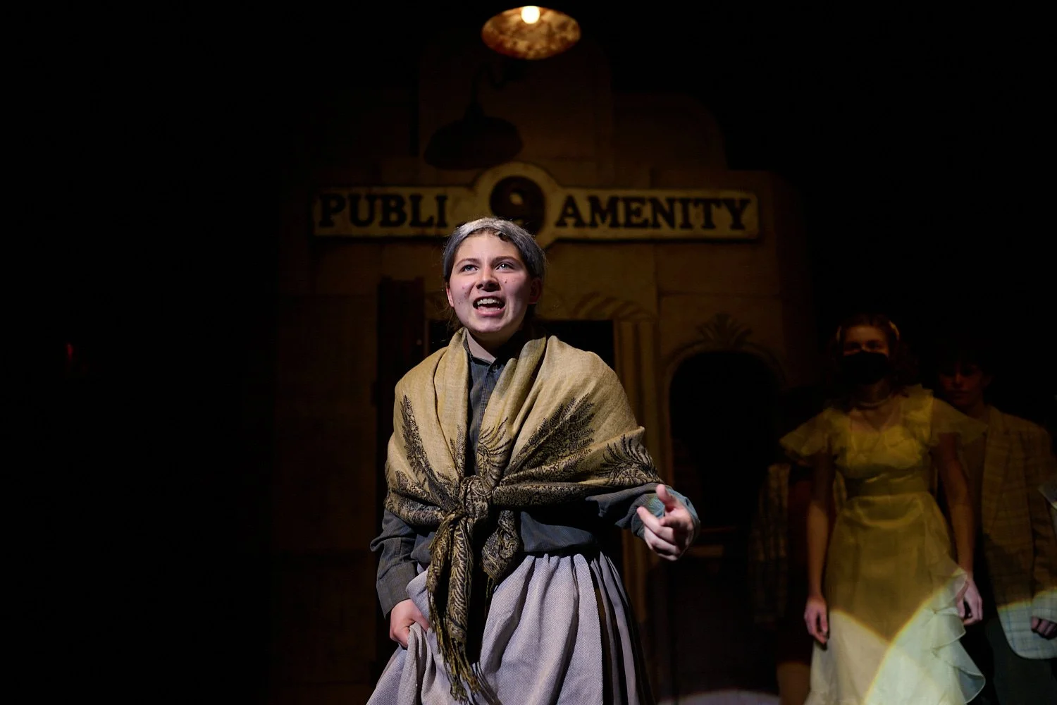 SEWICKLEY, PA, USA - MARCH 2ND 2022: High School students of Sewickley Academy are performing in an annual musical show “Urinetown” running on March 3rd-5th 2022. Brooke Menzock