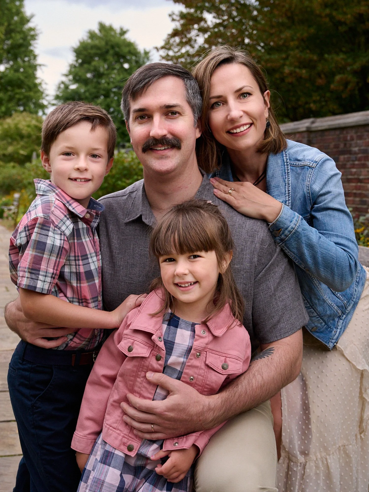  Anna Chrabaszcz is posing for a family photoshoot with her husband, her seven-year-old son and her 4-year-old daughter in Mellon Park of Pittsburgh Downtown, Western Pennsylvania on a warm afternoon. 