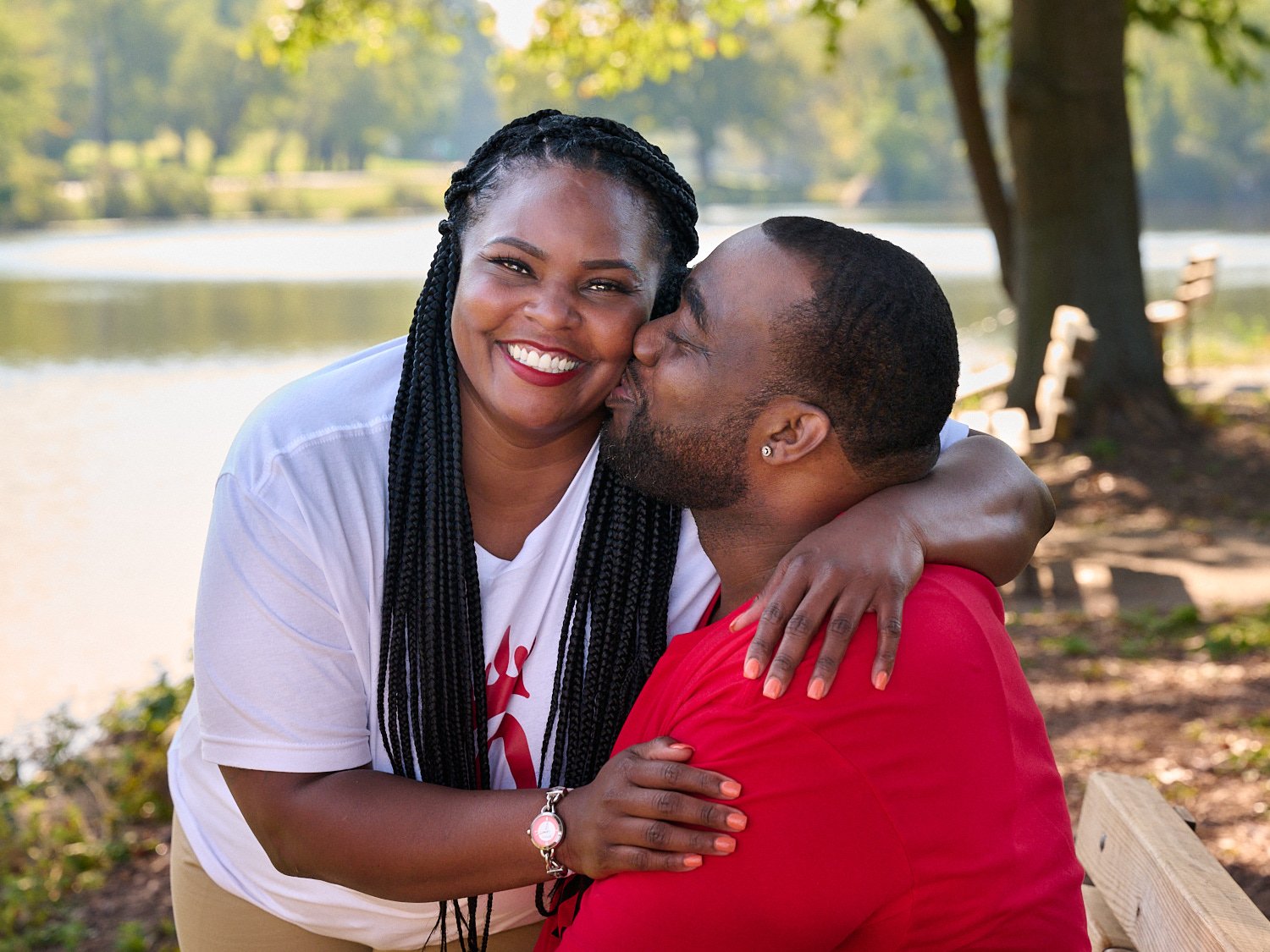  Patrice Carter is posing with her fiance for fun and intimate photos on Marshall Island in North Park near Pittsburgh, PA. It’s a sunny day on the lake shore and the couple looks happy and in love. 