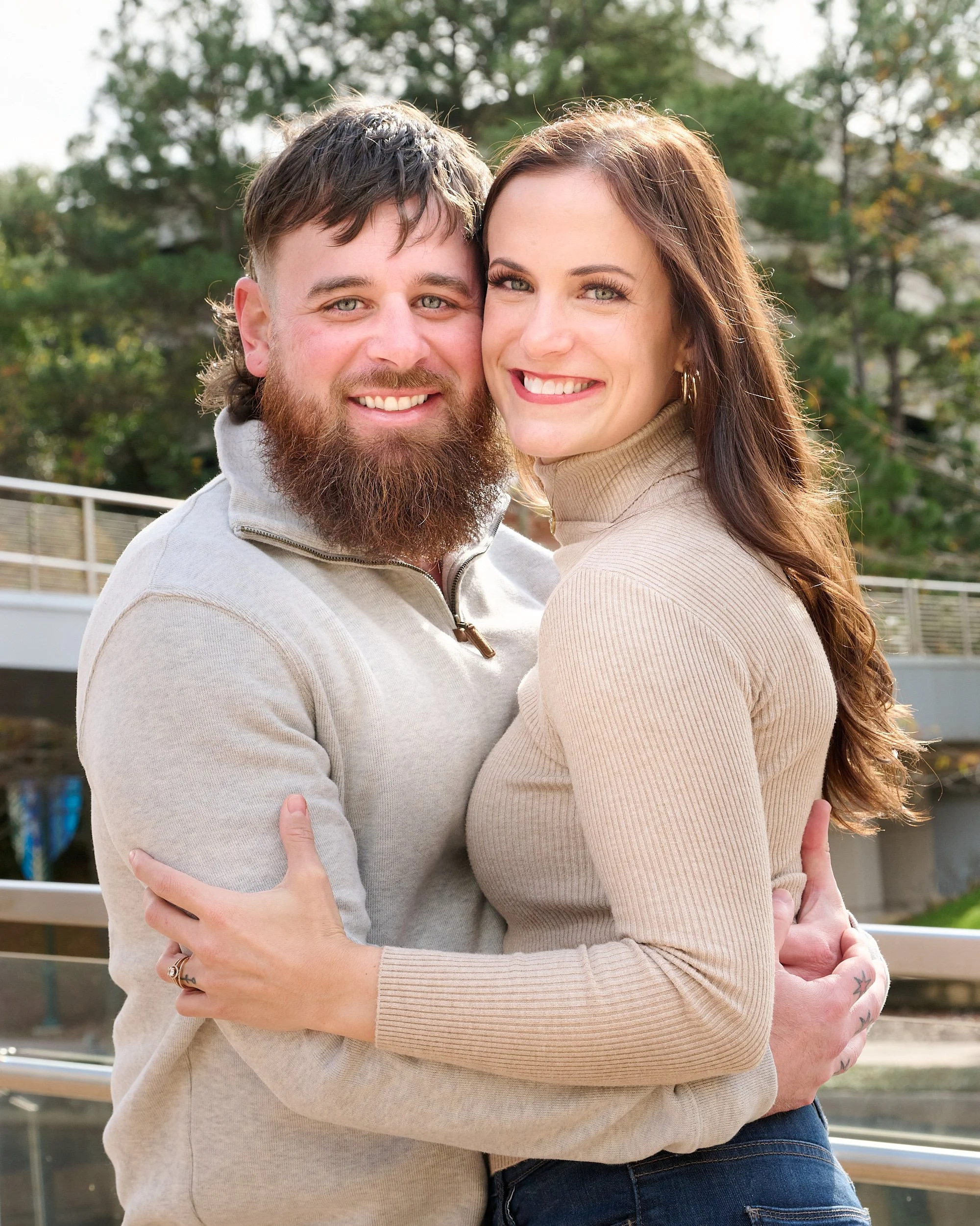  THE WOODLANDS, TEXAS - DECEMBER 2022: Katie Sikorski and her 12 family members are posing for annual Christmas cards on the embankment of The Woodlands Waterway. Fall foliage colors are still there. 