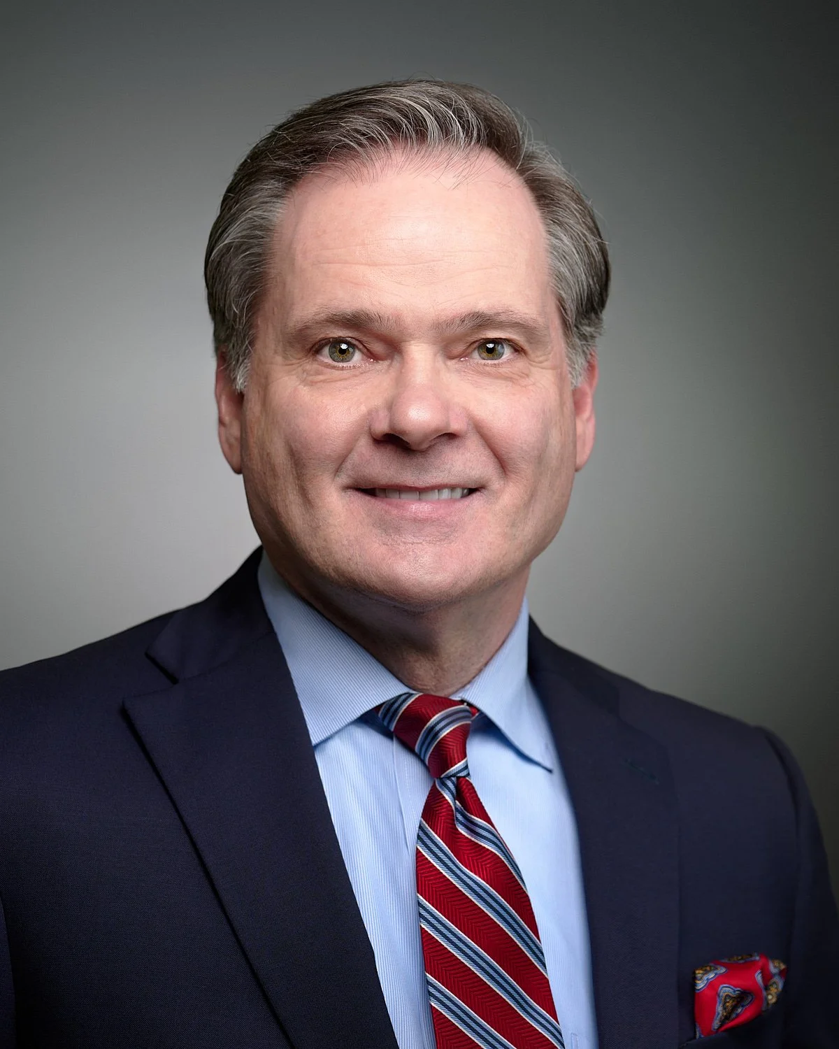  THE WOODLANDS, TEXAS - APRIL 2023: Jim Sloan, a wealth manager at Jim Sloan & Associates, is posing in his office for a feature in Living Magazine South about the rising tax environment & retirement. 