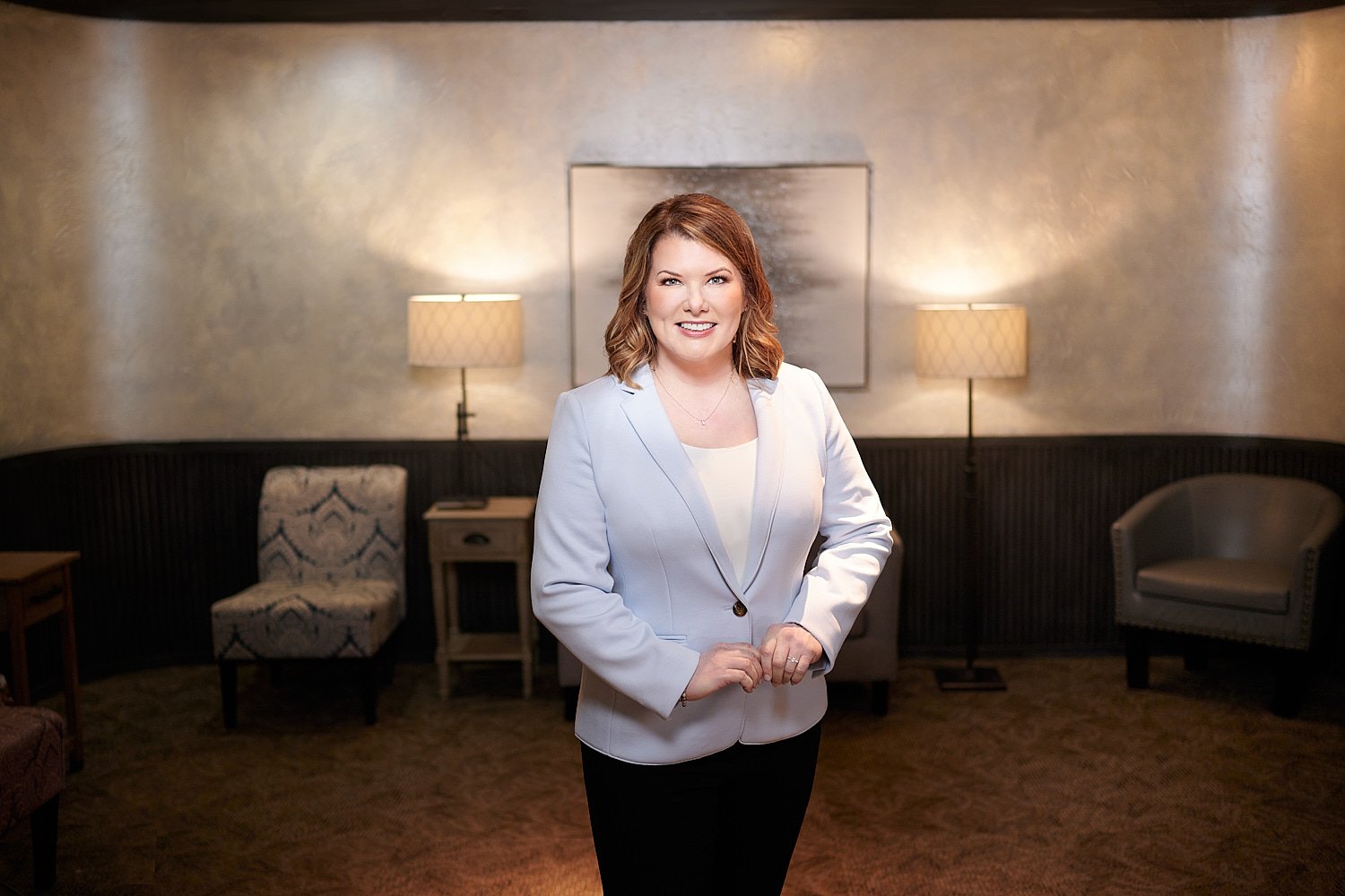  THE WOODLANDS, TEXAS - FEBRUARY 2023: a dental surgeon is posing for environmental business portraits in her practice. She specializes in Laser Dentistry, DURAthin, Lumineer veneers, dental implants. 