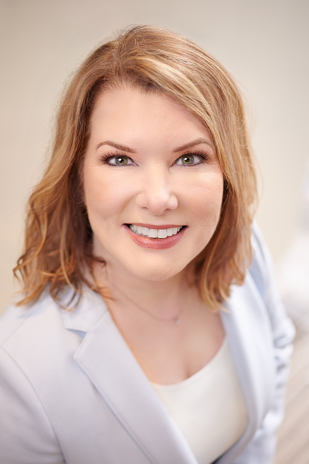  THE WOODLANDS, TEXAS - FEBRUARY 2023: a dental surgeon is posing for environmental business portraits in her practice. She specializes in Laser Dentistry, DURAthin, Lumineer veneers, dental implants. 