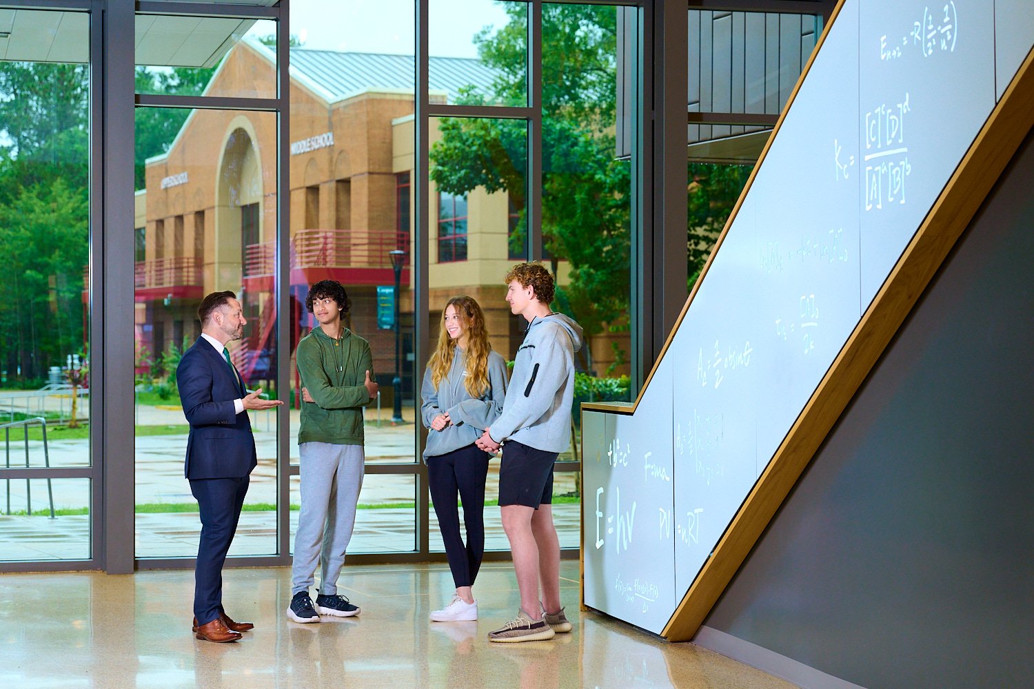  THE WOODLANDS, TEXAS - May 10th 2023: The John Cooper School’s headmaster Dr Stephen Popp is pictured with senior students inside the state of the art science building in The Woodlands, Texas. 