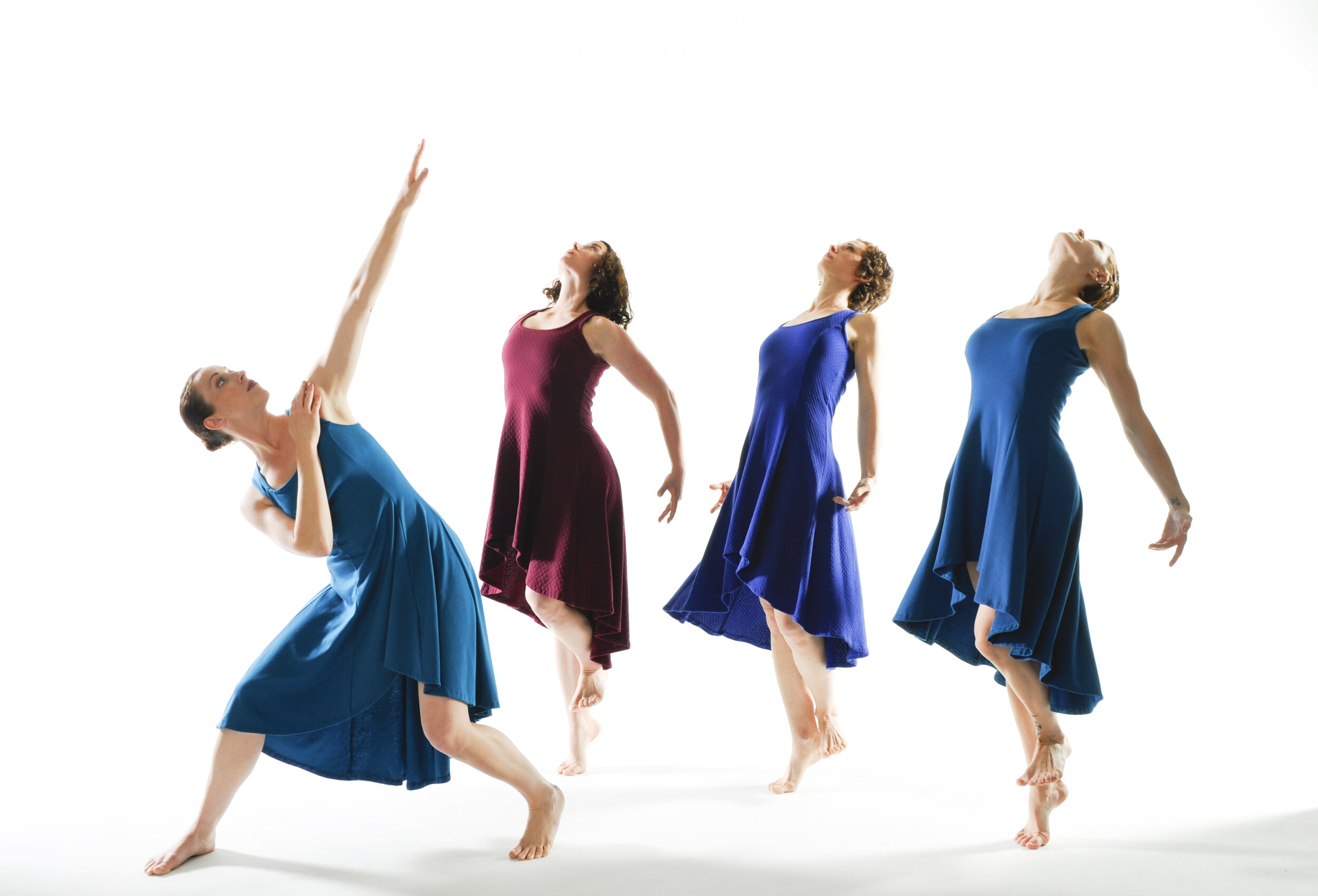 Company Dancers Jumping in Blue Dresses