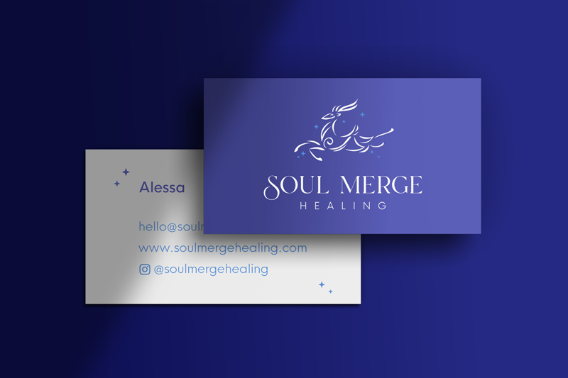 Business card for Soul Merge Healing featuring a purple logo with a unicorn outline and contact details for Alessa