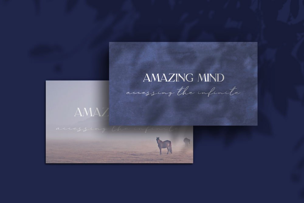 Two overlapping cards with text reading 'AMAZING MIND' and 'accessing the infinite.' The top card has a blue marbled texture, and the bottom card shows a misty landscape with a horse in the background.