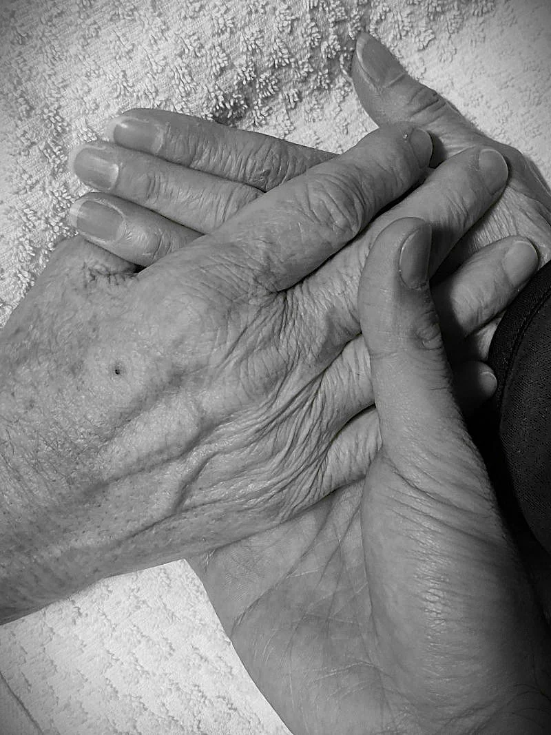 holding hands at the hospital.