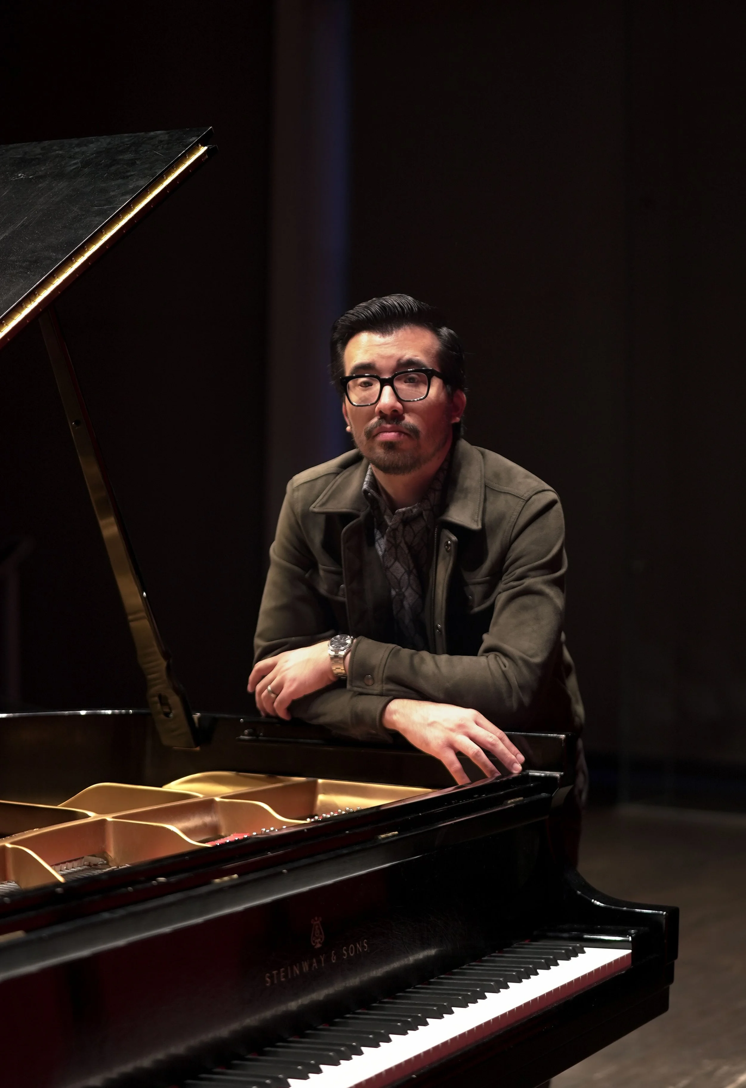 Striking a pose at the piano (Voxman Music Building)